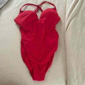 Beautiful red Seafolly one piece swimsuit that crosses in the back.